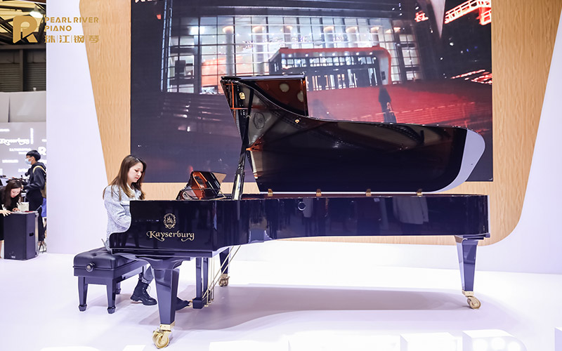 Enjoying playing one of our concert grand pianos